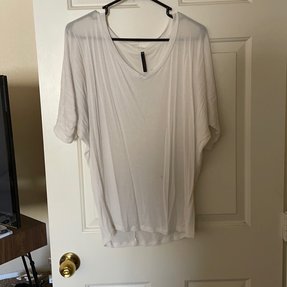 White flowing blouse